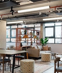 Desks and comfortable chairs in an office in London